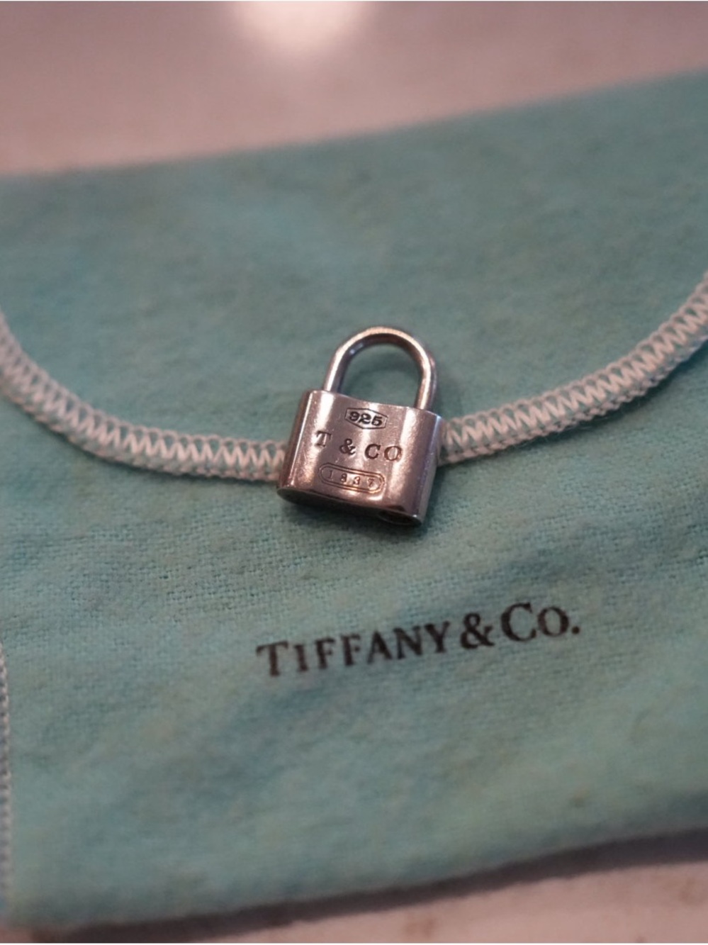Tiffany & Co. Sterling Silver Padlock Charm with original pouch